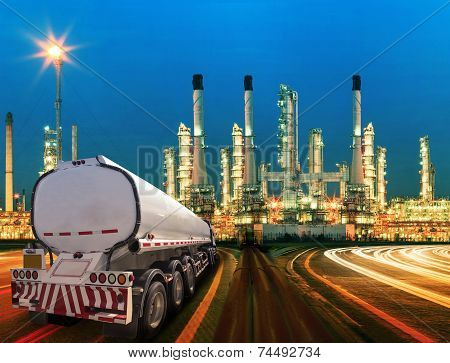 Petroleum Container Truck And Beautiful Lighting Of Oil Refinery Plant In  Heav Petrochemicaly Indus