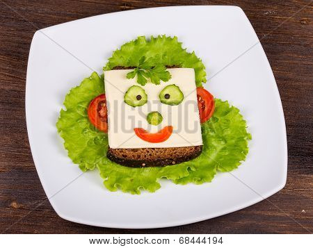 Face On Bread, Made From Cheese, Lettuce, Tomato, Cucumber And Pepper