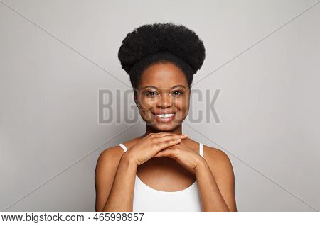 Young Smiling Woman With Perfect Fresh Clear Skin Looking At Camera On White. Beauty, Facial Treatme