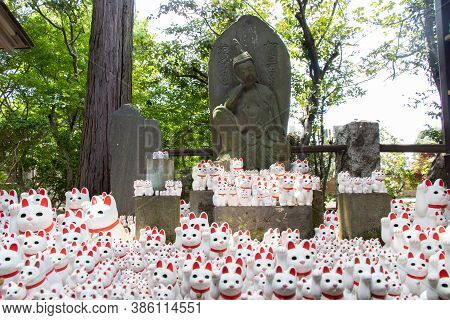 Tokyo, Japan - May 4, 2019 : Crowd Of Lucky Cat (luck Inviting Cat Figure) In Gotokuji Temple That L