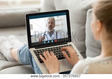 Female Patient Consult With Doctor Online Using Video Call