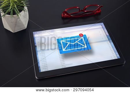 E-mail Marketing Concept. New Email Notification On Tablet Computer.