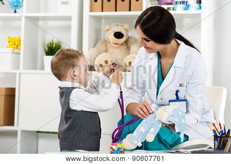 Pediatrician With Patient