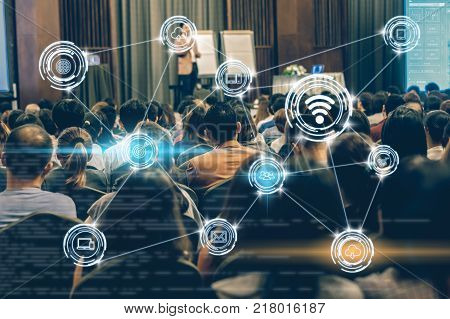 Wireless communication connecting of smart city Internet of Things Technology over Abstract blurred photo of conference hall or seminar room with attendee background technology with education concept, 3D illustration