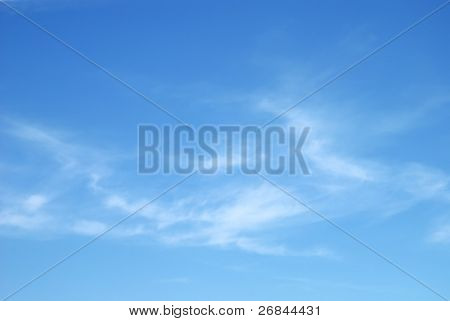 Fantastic soft white clouds against blue sky