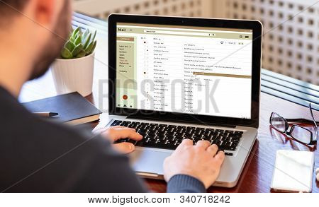 Emails List On A Laptop Screen, Office Workspace