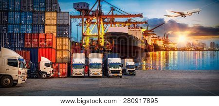 Logistics And Transportation Of Container Cargo Ship And Cargo Plane With Working Crane Bridge In Sh