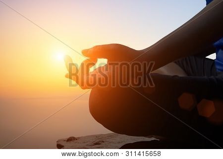 Young Women Meditate While Doing Yoga Meditation, Spiritual Mental Health Practice With Silhouette O