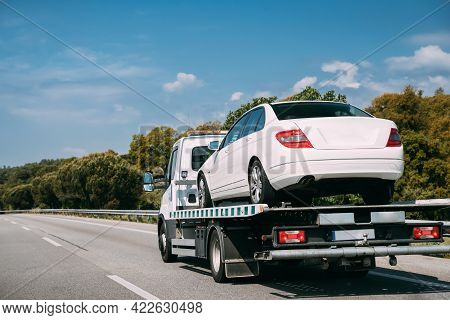 Car Service Transportation Concept. Tow Truck Transporting Car Or Help On Road Transports Wrecker Br