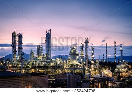 Manufacturing Of Petroleum Industrial Plant On Sky Twilight Background, Oil And Gas Refinery Or Petr