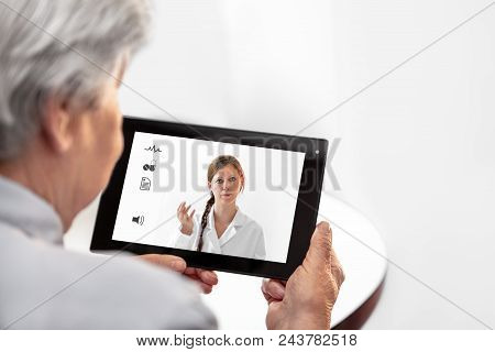 Telemedicine Or Telehealth With A Doctor And A Senior Woman With Tablet, Copyspace