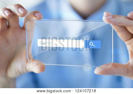 business, technology, internet and people concept - close up of woman hand holding and showing transparent with browser search bar on screen smartphone at office