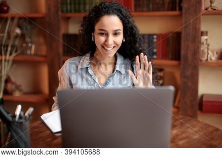 Online Video Call. Portrait Of Smiling Woman Sitting At Desk, Making Virtual Conference On Laptop, W