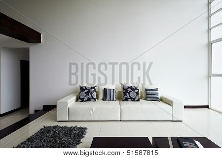 Interior design series: Modern living room with big empty white wall