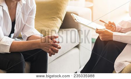 Doctor Or Psychiatrist Consulting And Diagnostic Examining Stressful Woman Patient On Obstetric - Gy