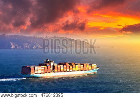 Container Cargo Ship In San Francisco Bay In San Francisco At Sunset, California, Usa