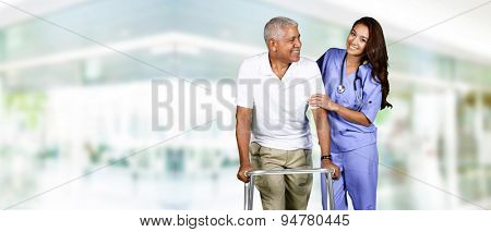 Health care worker helping an elderly man 