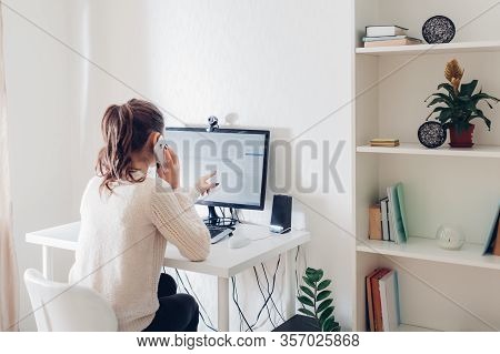 Work From Home During Coromavirus Pandemic. Woman Stays Home. Workspace Of Freelancer. Office Interi