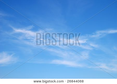 Fantastic soft white clouds against blue sky