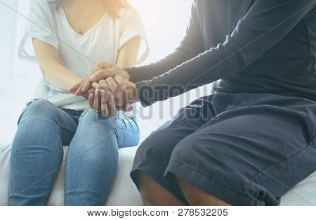 Man Giving Hand To Depressed Woman,suicide Prevention,mental Health Care Concept