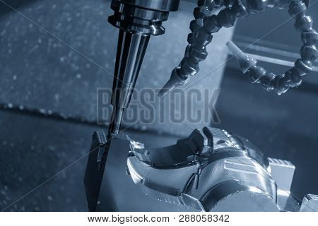 The  Cnc Milling Machine Cutting The Mould Part With The Solid Ball End Mill Tool.the Hi-technology 