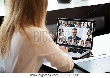 People Engaged In Group Videocall, Laptop Screen Webcam Application View