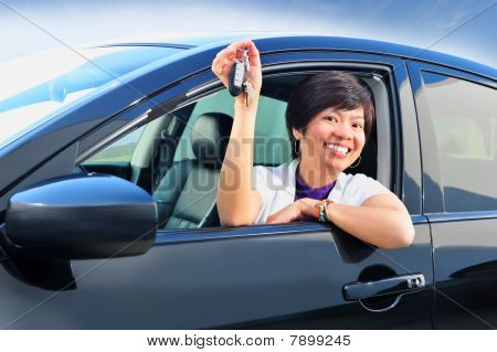 Woman with new car keys